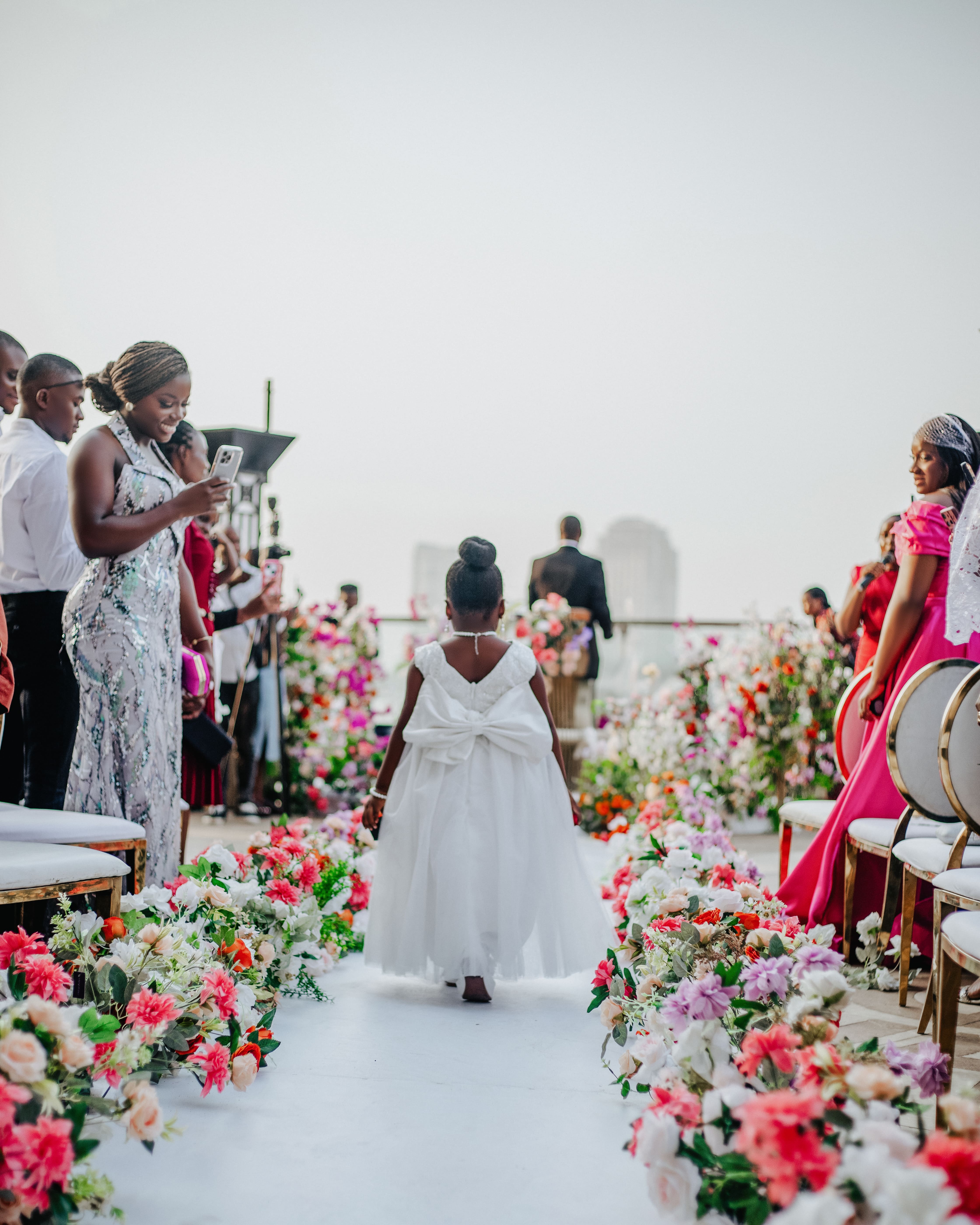 Beachside wedding arch with flowers