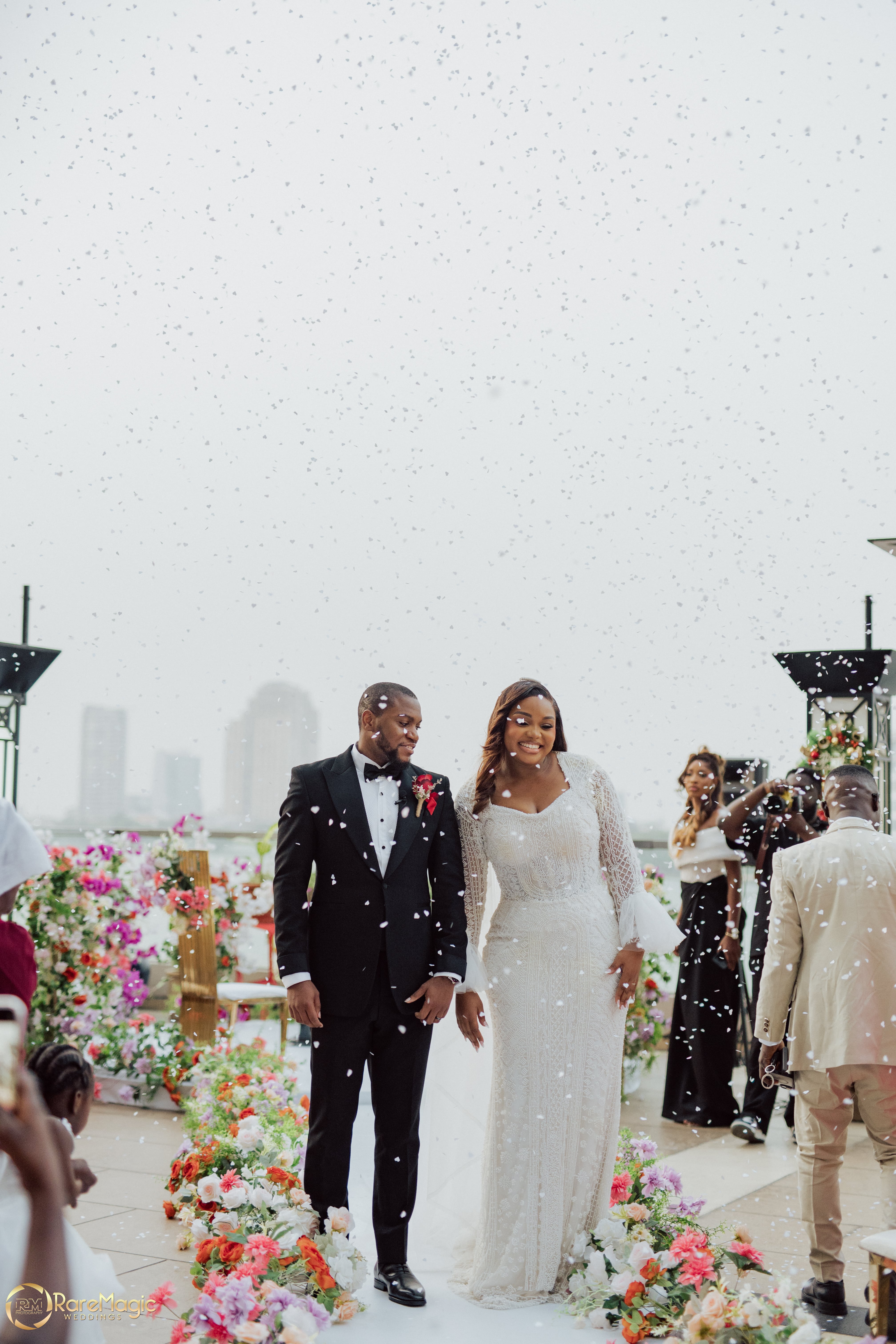 Beachside wedding arch with flowers
